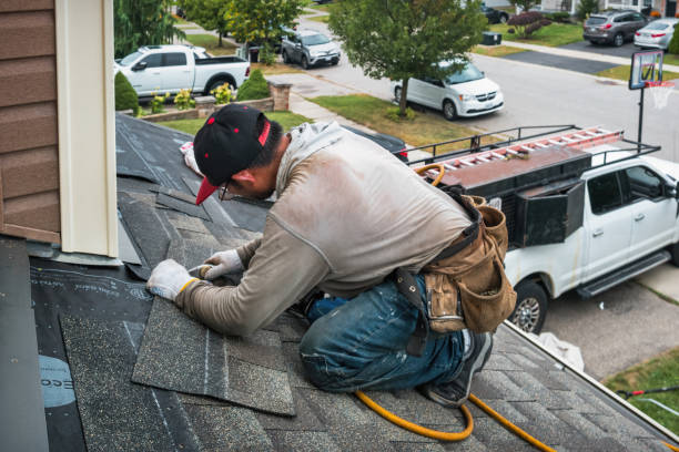 Professional Roofing technician working in Forest Oaks, NC